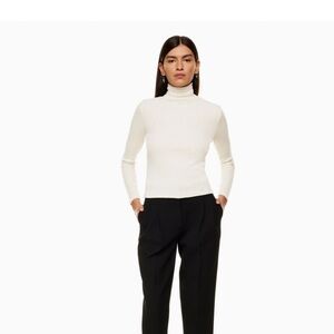 The Group by Babaton Traverse Turtleneck in light heathered grey